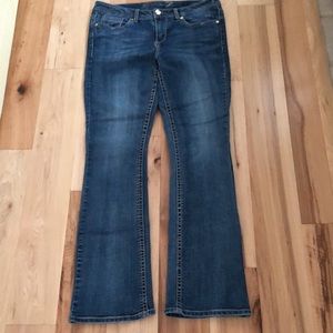 Seven7 women’s Jeans.  Size 10.  Blue.  Decorated pockets.